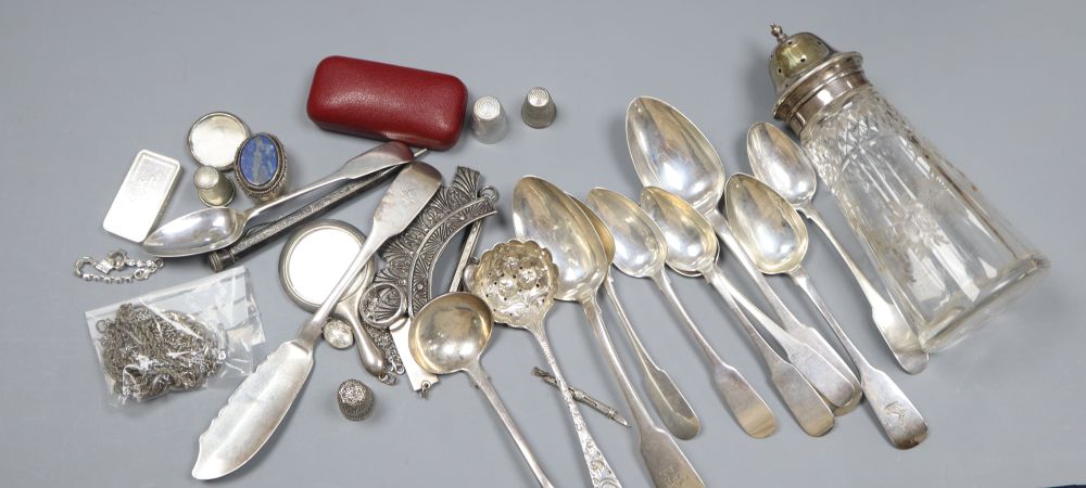 A mixed group of assorted silver flatware including 19th century Irish butter knife and other minor collectables.